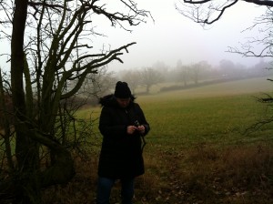 2013-12-12 Hatch End - Sharlene at cache 6.  Sometimes I just get lucky. I knew it was foggy and hoped that the photo would be moody and it was.